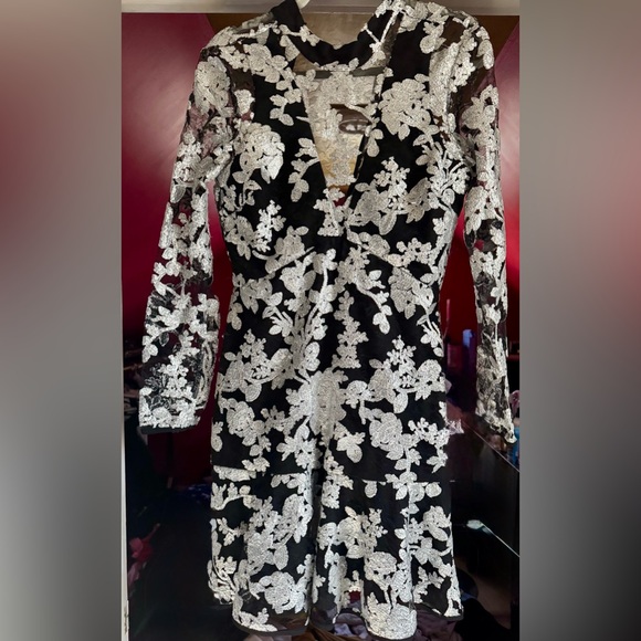 Adelyn Rae Dresses & Skirts - Adelyn Rae Black Dress with Silver Floral Lace Accents